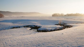 Le froid et le calme règnent dans les vallées d'altitude du Jura neuchâtelois, ici à La Sagne.